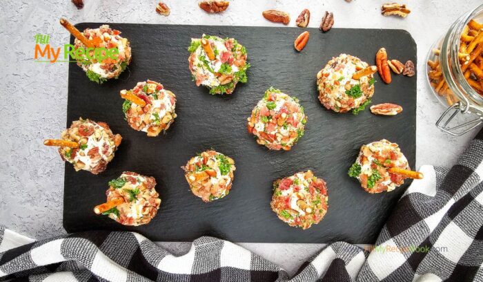 Mini Appetizer Cheeseballs Bites recipe for a No Bake party snack. Easy individual cheeseballs with bacon, pecan nuts, with a pretzel stick.