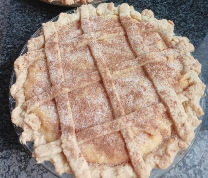 Tasty Milk Tart Recipe oven baked. Easy and quick homemade South African milk tart with a crust all baked in one. Makes two and freezes well.