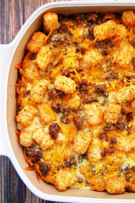Tater Tot Sausage Breakfast Casserole – great make ahead recipe!  Sausage, cheddar cheese, tater tots, eggs, milk, garlic, onion and black pepper. Can refrigerate or freeze for later. Great for breakfast. lunch or dinner. Everyone loves this easy breakfast casserole!!