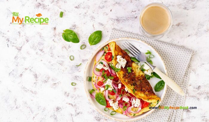 Tomato Feta Cheese Omelette Idea for breakfast. Easy homemade recipe with salad of cherry tomato, goat feta cheese and onion meal.