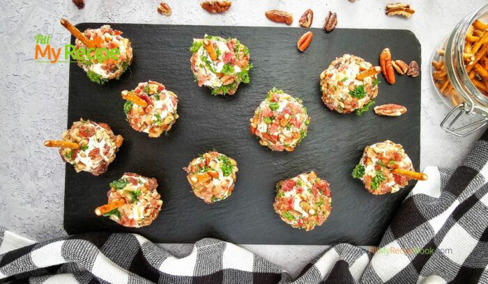 Mini Appetizer Cheeseballs Bites recipe for a No Bake party snack. Easy individual cheeseballs with bacon, pecan nuts, with a pretzel stick.