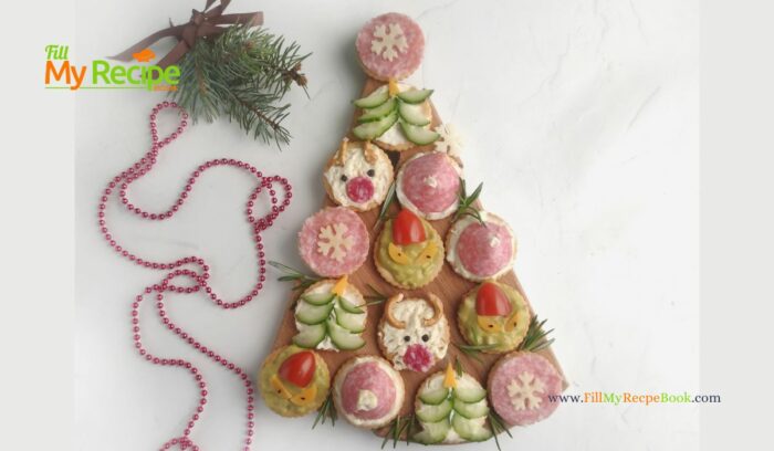 Simple Christmas Cracker Appetizers recipe ideas for snacks and treats. Crackers garnished with cream cheese, salami, cucumber, cherry tomato.