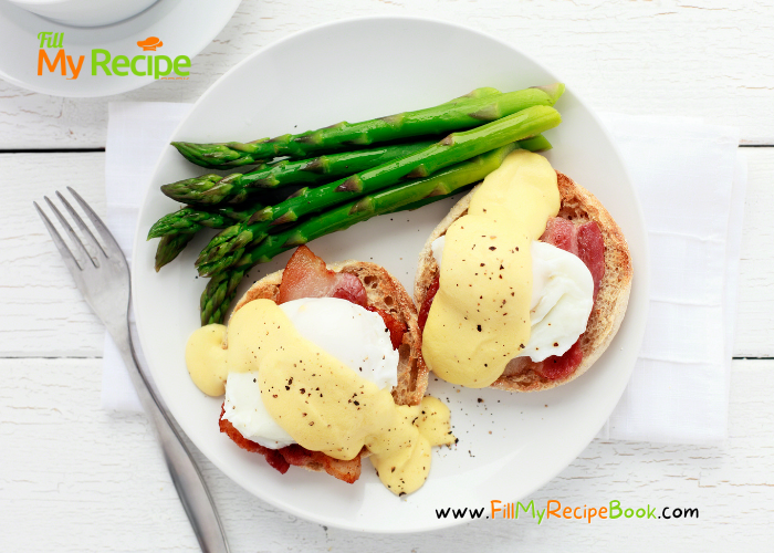 Eggs Benedict Breakfast Recipe idea, with asparagus or fried cherry tomato. Topped with hollandaise sauce, bacon on a English muffin.