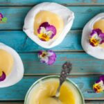 Mini Lemon Curd Filled Meringue recipe. Easy Meringue or pavlova nests filled with lemon curd served as a dessert or tarts.