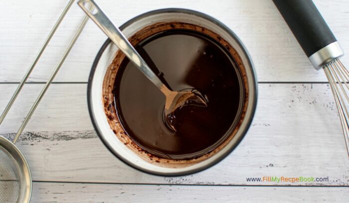 Bake these healthy Chocolate Drizzled Coconut Macaroons Recipe idea. With coconut oil and maple syrup added to the chocolate glaze.