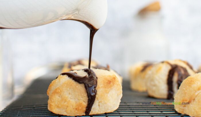 Bake these healthy Chocolate Drizzled Coconut Macaroons Recipe idea. With coconut oil and maple syrup added to the chocolate glaze.