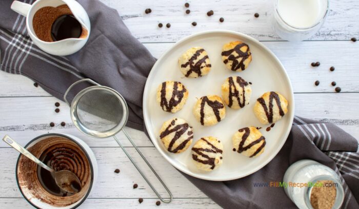 Bake these healthy Chocolate Drizzled Coconut Macaroons Recipe idea. With coconut oil and maple syrup added to the chocolate glaze.