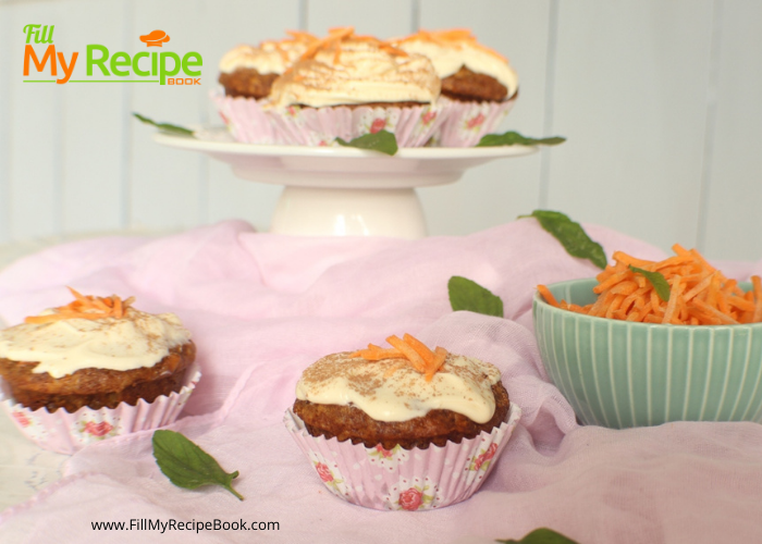 Carrot Cupcakes and Cream Cheese Frosting recipe. Moist easy healthy cupcake with pineapple decorated with icing a tradition at Easter.