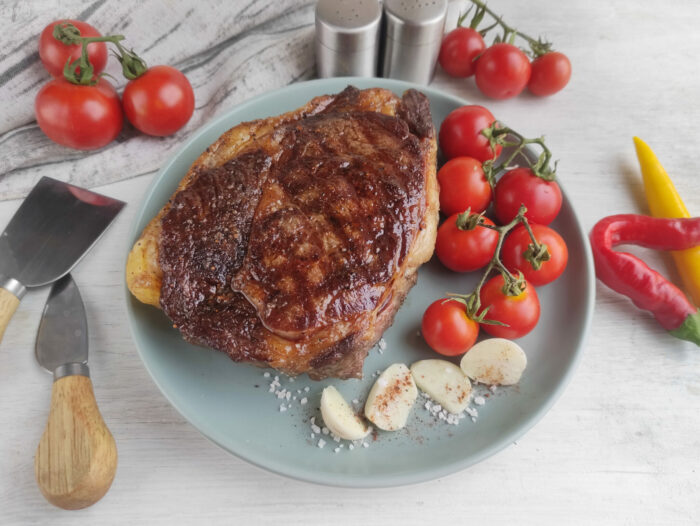 Best Grilled Ribeye Steak recipe in a cast iron pan. Easy stove top idea for dinner or lunch as the steak is grilled with butter, garlic.

