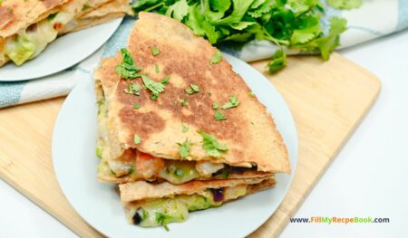 Spicy Tasty Keto Shrimp Quesadillas recipe idea to create for lunch or dinner. Pan sautéed shrimp and chili, cumin and jalapeño with avocado.