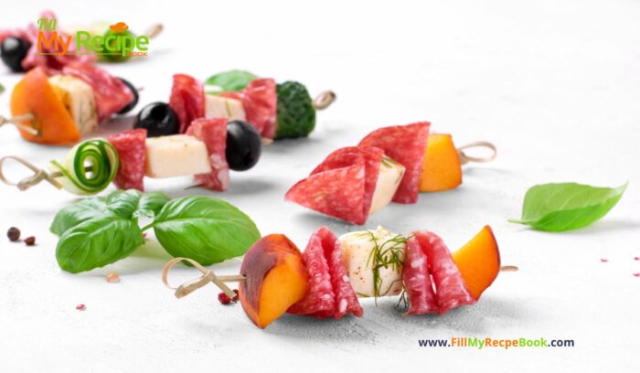 mini fruit skewers with salami snacks
