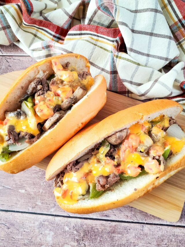 Homemade Cheesesteak Roll or sandwich recipe. The best easy idea for a roll up for lunch or a sub with melted cheese and sliced steak.
