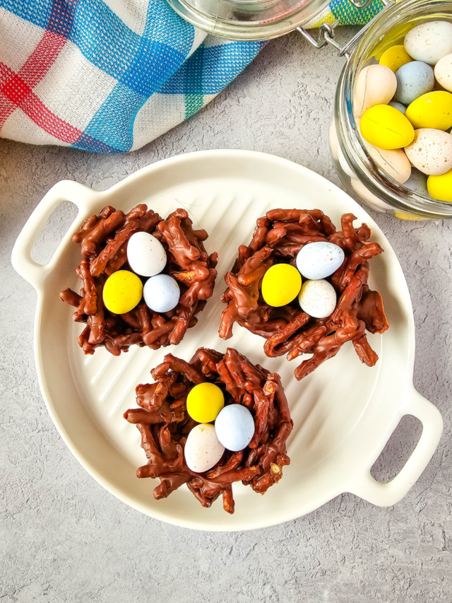 Easter Nest Haystack Treats recipe for snacks. Easy enough for kids to help make, with a chocolate nest and mini candy colorful coated eggs.