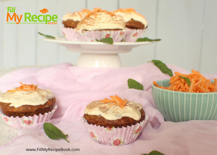 Carrot Cupcakes and Cream Cheese Frosting recipe. Moist easy healthy cupcake with pineapple decorated with icing a tradition at Easter.