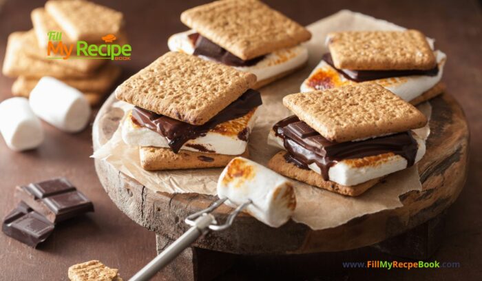 Homemade Marshmallow s’mores with Chocolate and crackers recipe idea. Melted marshmallows on the open fire while camping in spring or summer.