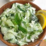 Creamy Sour Cream Cucumber Salad recipe with Feta and fresh Mint for a cold side dish. Healthy and lemon juice brings the tangy flavors.