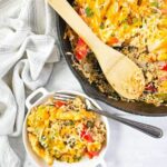 Easy Chicken Fajita Casserole Recipe in an iron skillet pan. The best go to dinner or lunch idea to cook on stove top then bake in the oven.