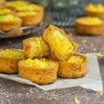Mini Lemon Custard Tart Recipe idea. Oven Baked in pre bought crusts with sour cream and egg, fillings garnished with lemon zest for dessert.