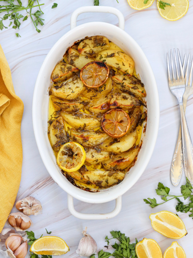 Easy Lemon Greek Potatoes Recipe for an oven bake idea. Homemade potato wedges with vegetable broth, garlic for a warm side dish for meals.