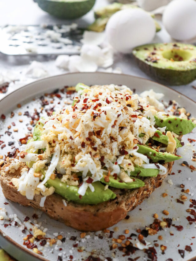 Nutritious Avocado Grated Egg on Toast recipe idea has a crispy bite with buttery avocado and grated boiled egg spiced with lemon pepper.