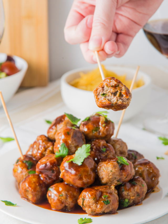 Sweet and Spicy Cocktail Meatballs recipe idea made from scratch. Mini beef appetizers oven baked with honey and barbecue sauce on a stick.