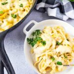 Iron Skillet Chicken Alfredo Casserole recipe. An easy creamy pasta bake for quick night dinners or lunch the family will love.