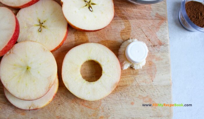 Slice apples horizontally into ¼ inch slices. Using a cap, push out the core. Apple Strudel Slices Recipe to have for a sweet dessert. Simple homemade from scratch idea with wrapped phyllo dough on apple rounds, snack.