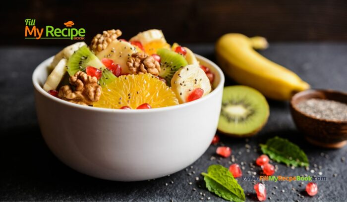 Healthy Kiwi Fruit Salad with Walnuts with pomegranate, orange pieces, banana, chia seeds. An easy recipe idea to create for a winter salad.