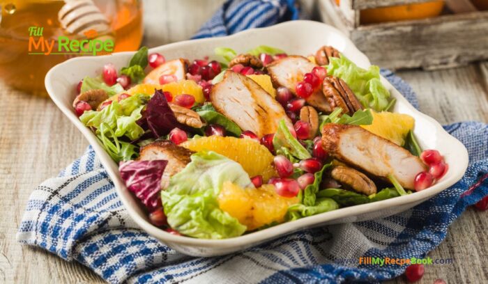 Spring Salad Chicken Pomegranate Honey recipe idea for summer or spring. Healthy side dish has orange, nuts, lettuce and a drizzle of honey.