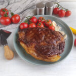 Best Grilled Ribeye Steak recipe in a cast iron pan. Easy stove top idea for dinner or lunch as the steak is grilled with butter, garlic.