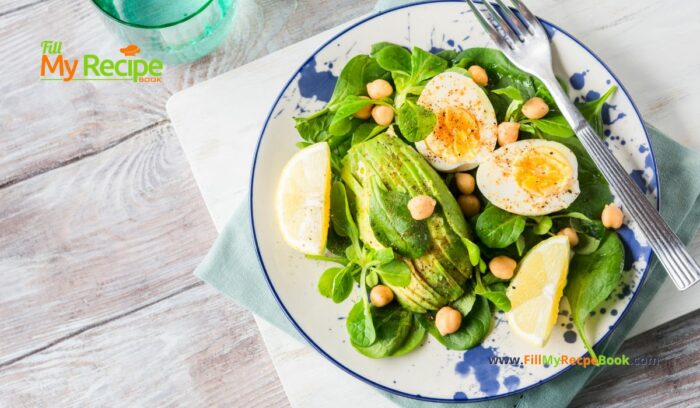 Avocado Spinach Chickpeas Eggs Salad recipe idea for a protein filled lunch that is ready in five minutes, drizzled with lemon and olive oil.