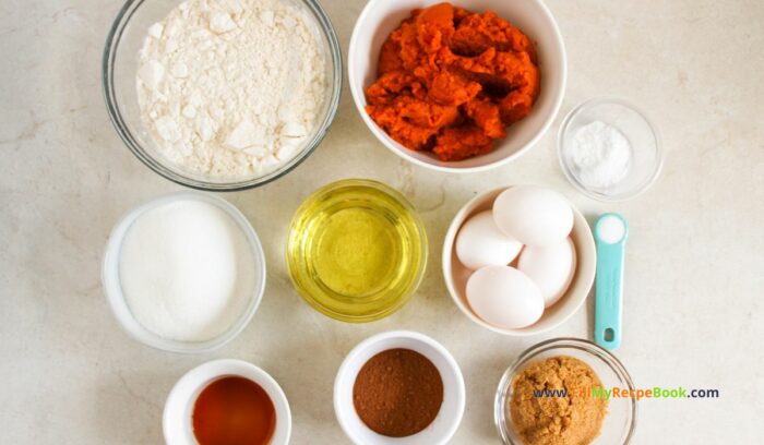 the ingredients, Best Pumpkin Cake recipe with salted caramel cream cheese frosting. A delicious dessert using pumpkin puree, pumpkin spices for fall treat.