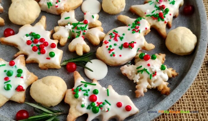 Cream Cheese Christmas Cookies recipe idea for snacks and treats. A melt in your mouth creamy soft biscuit or cookie decorated.