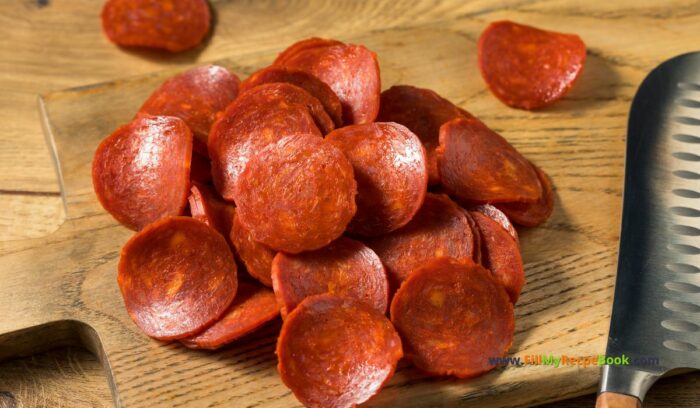 sliced pepperoni, Fresh Mini Pizza Appetizer recipe idea. Easy healthy two ingredient pizza base with pepperoni and cheese for snacks on platters.