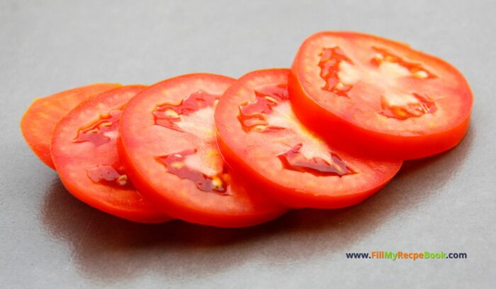 sliced tomato, for Fresh Mini Pizza Appetizer recipe idea. Easy healthy two ingredient pizza base with pepperoni and cheese for snacks on platters.