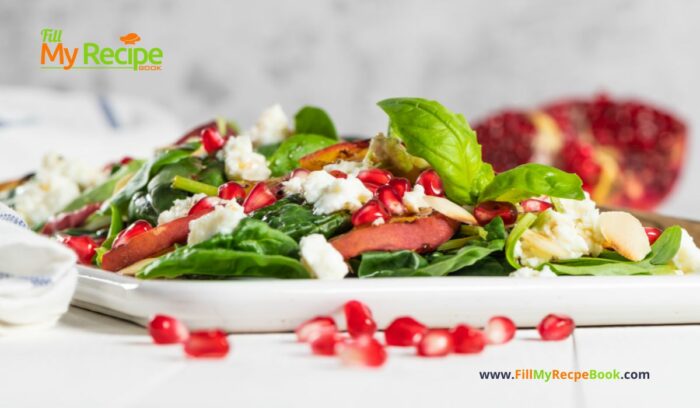 A Fresh Pomegranate Feta Salad recipe with grilled peaches and spinach leaves. A side dish or breakfast meal drizzled with a honey dressing.