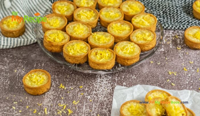 Mini Lemon Custard Tart Recipe idea. Oven Baked in pre bought crusts with sour cream and egg filling, garnished with lemon zest for dessert.