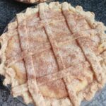 Tasty Milk Tart Recipe oven baked. Easy and quick homemade South African milk tart with a crust all baked in one. Makes two and freezes well