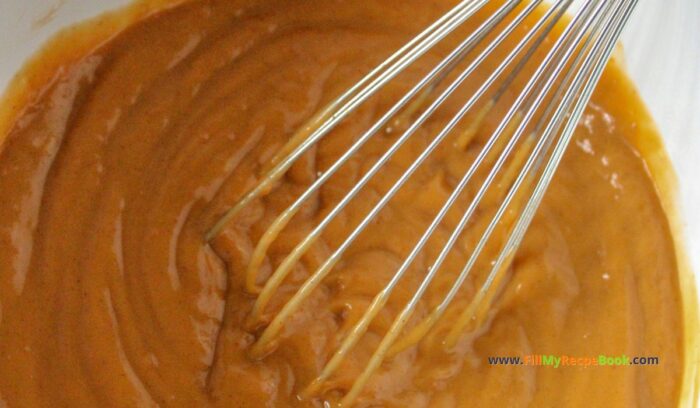 mixing the pumpkin pudding mix with milk. Easy No Bake Pumpkin Cheesecake tart recipe idea. Makes two with biscuit or cookie base for a thanksgiving dessert pie for family to enjoy.   