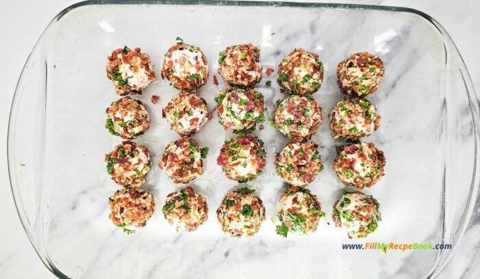 chill int he fridge covered with plastic for at least an hour before serving. Mini Appetizer Cheeseballs Bites recipe for a No Bake party snack. Easy individual cheeseballs with bacon, pecan nuts, with a pretzel stick.