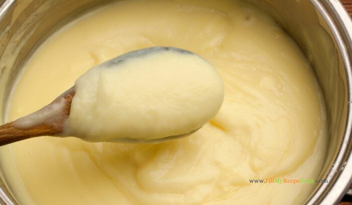 boiling custard on the stove top to a thick consistency for the banana pudding trifle for festive season.