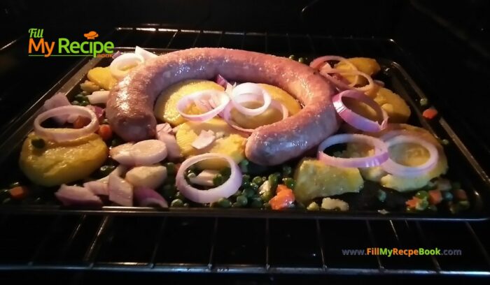 Sheet Pan Sausage and Veggies with Potatoes Recipe. Enjoy a simple, flavorful meal all in one dish! This recipe features a delicious mustard onion sausage roasted alongside vibrant vegetables and tender potatoes in the oven.