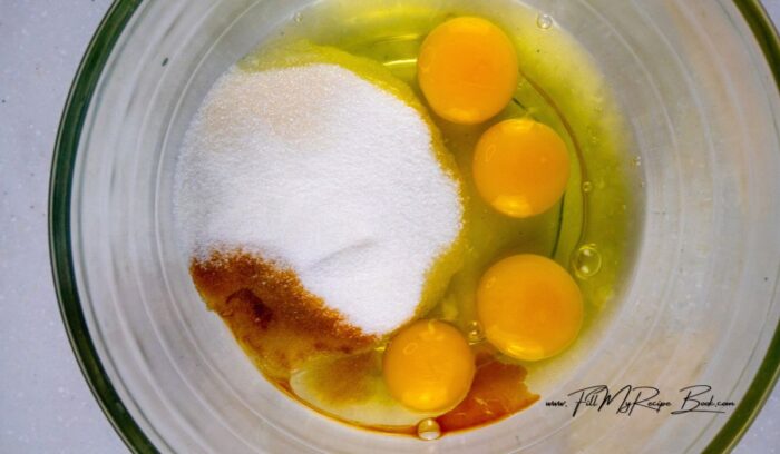 mixing the ingredients in a bowl. for An Easy Healthy Crustless Custard Pie recipe for dessert. Mix in one bowl, suits diabetic or keto and gluten free, low carb diets. Delicious.