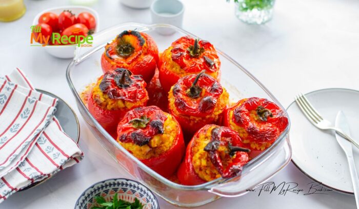 When all the veggies and chicken and rice are cooked add them all into a bowl and mix them up thoroughly. This will be the peppers stuffing. Add these fillings to the peppers, and close them with the tops of the bell peppers.