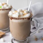 Try this easy Cozy S’mores Latte recipe for a comforting beverage. It combines coffee and chocolate with warm milk, topped off with delightful mini marshmallows.