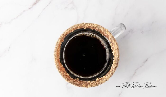 Mix the Espresso or Coffee and Syrup. Brew your espresso (or coffee). In your prepared mug, pour the espresso (or coffee) and stir in the s’mores syrup.