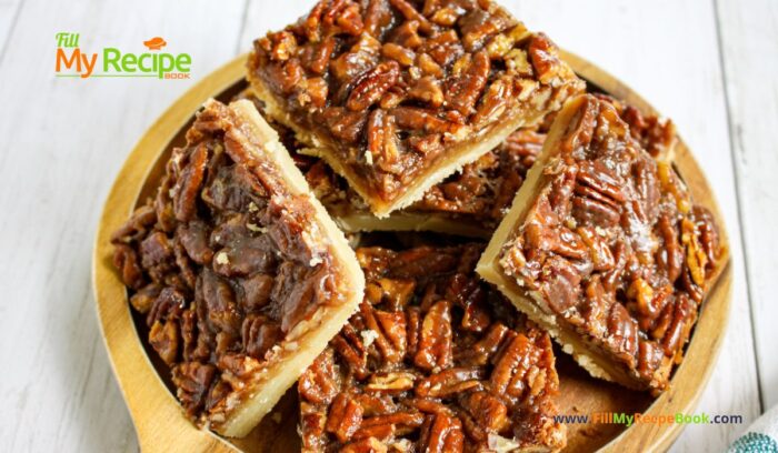 Easy Shortbread Pecan Bars recipe. A shortbread crust topped with pecan nuts, honey, cream and brown sugar for a healthy snack bar.