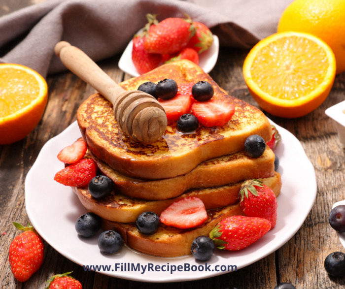 French Toast with Blueberries and Strawberries. A special occasion breakfast to be made adding berries and honey.