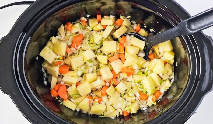 Add the seasonings and stir well to mix. this slow cooker vegetable dish is made with stock for a corned beef casserole.