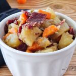 Homemade easy corned beef hash recipe with vegetables cooked in a slow cooker, then fry the corned beef and add it to the dish for for a meal.